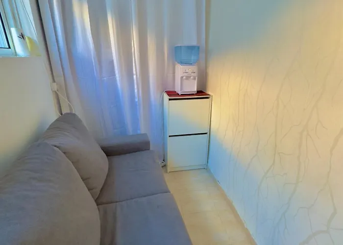 Em *